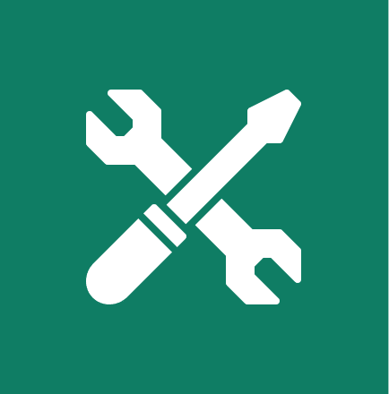 Wrench and screwdriver crossed on green background.